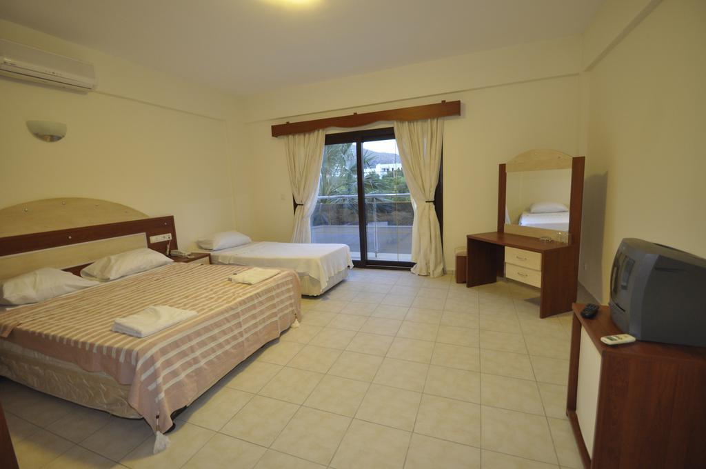 Ado Beach Hotel Тургутрейс Номер фото