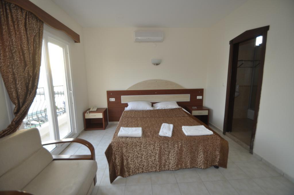 Ado Beach Hotel Тургутрейс Номер фото